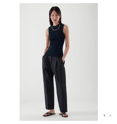 PLEATED LINEN TROUSERS