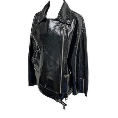 Black glossy leather detail over jacket